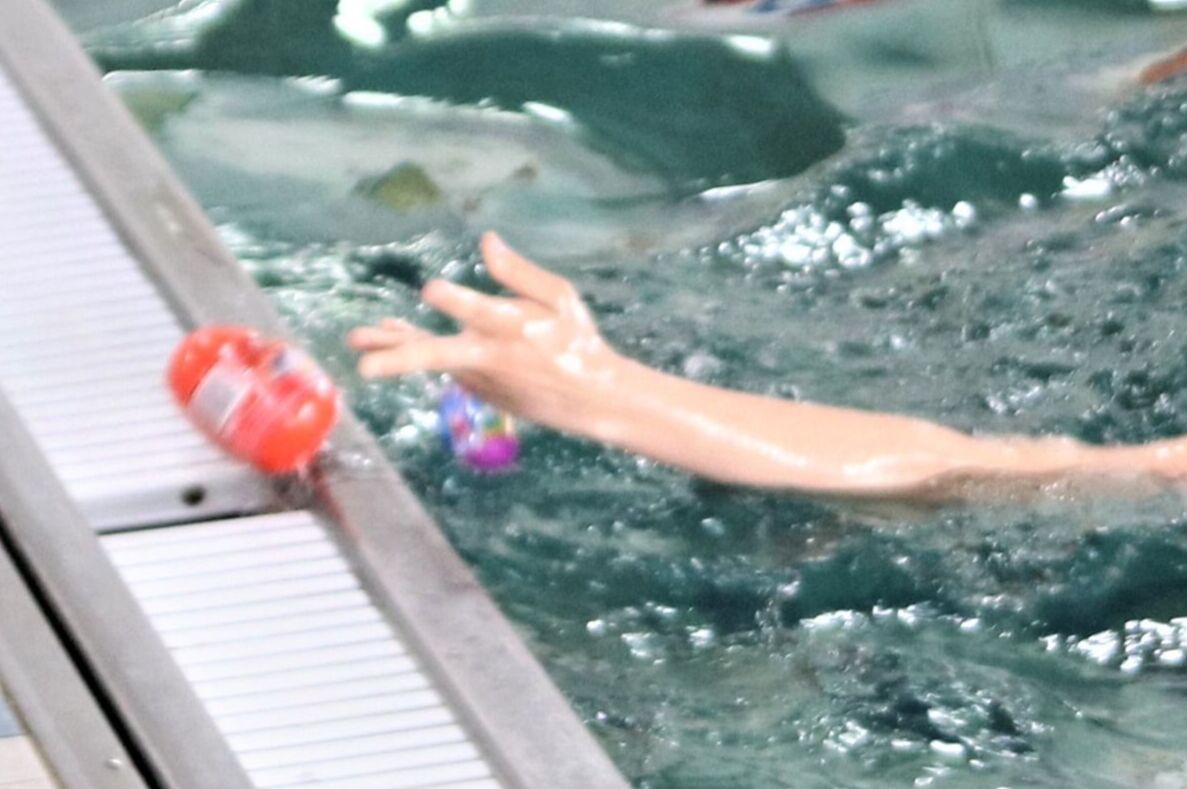 Boy at the pool's edge